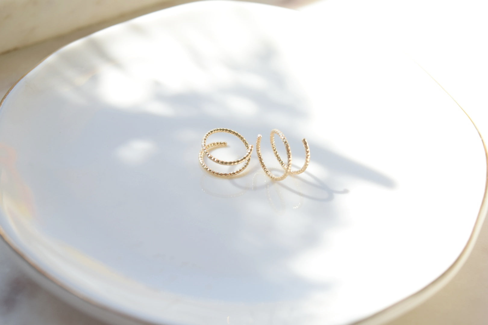 Sparkle twist hoops